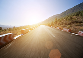 Photo of an isolated road vanishing into the distance.